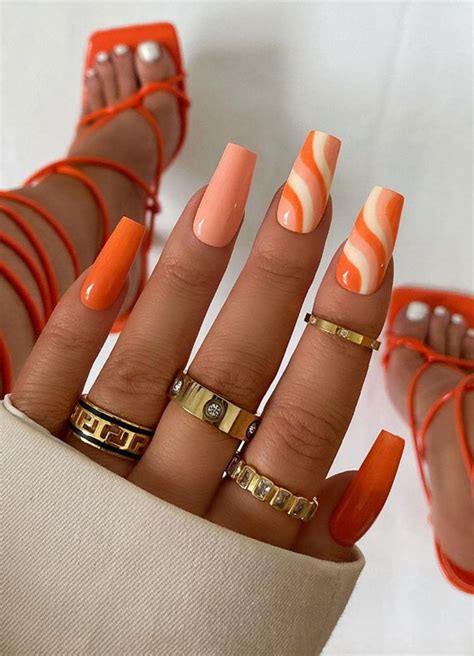 Cute Orange Nail Ideas To Rock In Summer Orange Swirl Coffin Nails