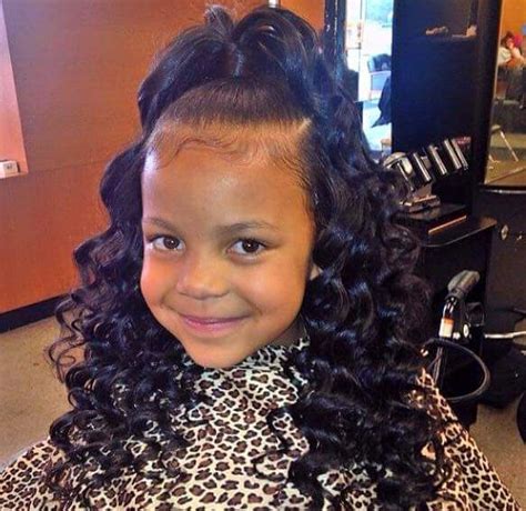 Twists are pretty cute natural hairstyles and they're a popular choice for those who want black natural hairstyles. This is a really cute style for a little girl. #Ninie ...