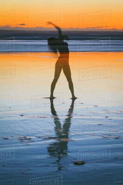 Abstract Of A Naked Female On The Beach At Sunset Stock Photo Dissolve