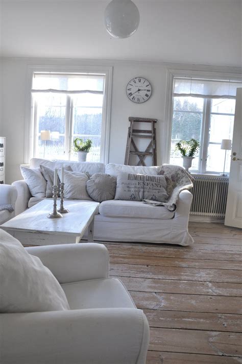 Lovely Simple And Uncluttered Living Room White Slipcovers Make The