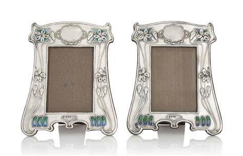 A Pair Of Art Nouveau Silver And Enamel Photograph Frames Mark Of