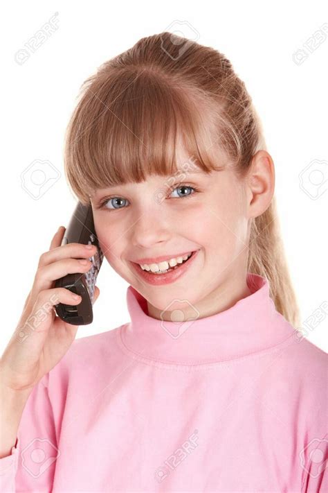 Little Girl Talking On A Black Cordless Phone Smiling Stock Photo