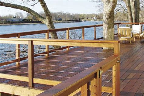 Building a deck or porch railing? HandiSwage™ Cable Railing = this to redo the back deck. less wood and more view | House Ideas ...