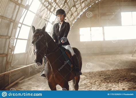 The Rider In Black Form Trains With The Horse Stock Image Image Of