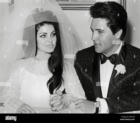 Elvis And Priscilla Presley Kissing At Their Wedding Photo Print