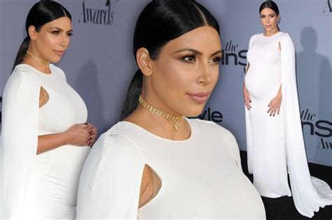 Kim Kardashian Shows Off Her Massive Baby Bump In Form Fitting White