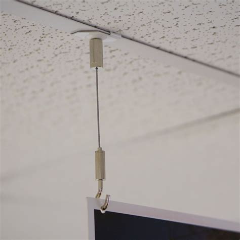 False ceilings (suspended ceilings/drop ceilings) comprise a ceiling grid onto which suspension fittings. Grid ceiling hangers for POS | Sign-Holders.co.uk