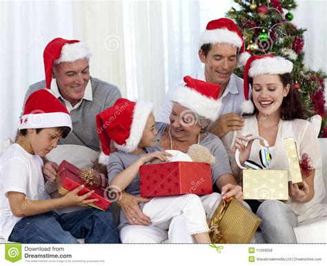 Family Opening Christmas Presents at Home Stock Photo  Image of