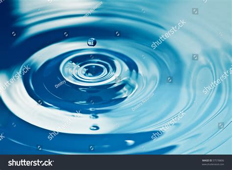 Water Drop Making Ripple On Surface Stock Photo Edit Now 57578806