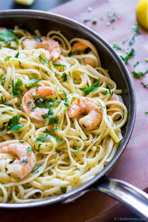 Shrimp sautéed in easy scampi sauce with garlic, butter, olive oil, and white wine, tossed with red pepper flakes and parsley. Garlic Shrimp Scampi Linguine Recipe | ChefDeHome.com
