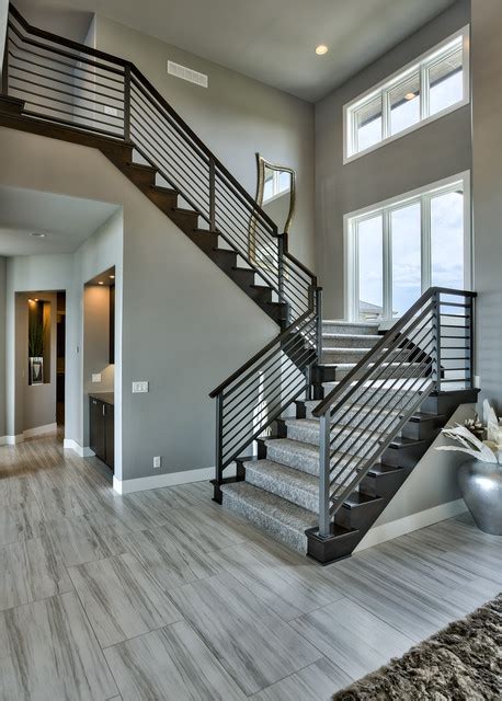 We have finally 100% completed our flooring install. Lakeside Luxe - Moderne - Escalier - Omaha - par Nathan Homes LLC