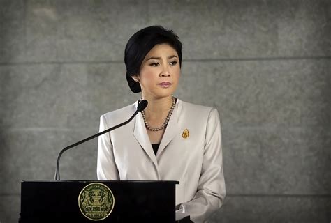 thai beauty prime minister yingluck she fled for 6 years and was guarded by her brother but