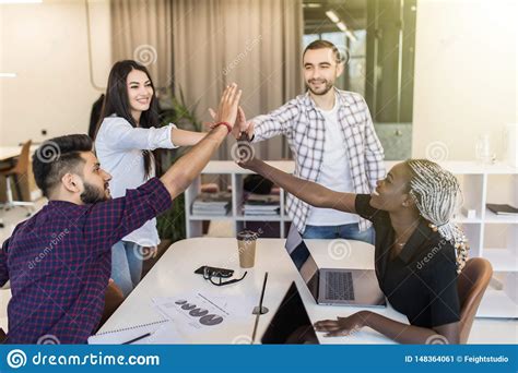 Group Of Young Multiethnic Diverse People Gesture Hand High Five