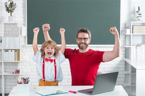 Excited School Kid And Teacher Learning Study In Class Education And