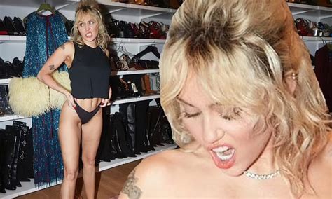 Miley Cyrus Goes Topless In A Pair Of Black Undies 7 Photos