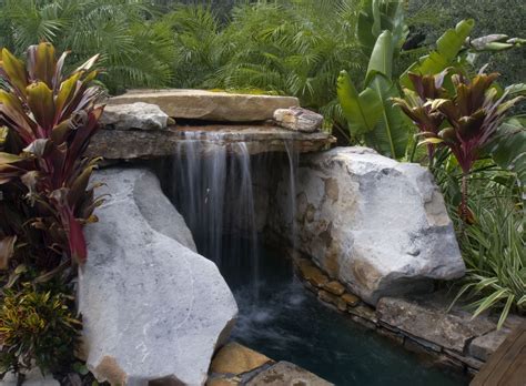 Natural Stone Grotto Waterfall With Elevated Spa