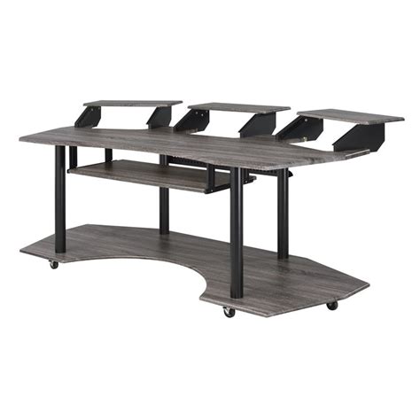 Perfectly fit for every workspace, this suitor music recording studio desk offers style without sacrificing function. eleazar music recording studio desk in black oak - 92895