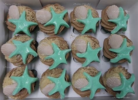 12 Pack Of Cupcakes Decorated With Sea Shells And Starfish