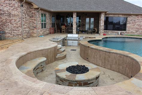 Sunken Outdoor Kitchen And Fire Pit With Lazy River Pool