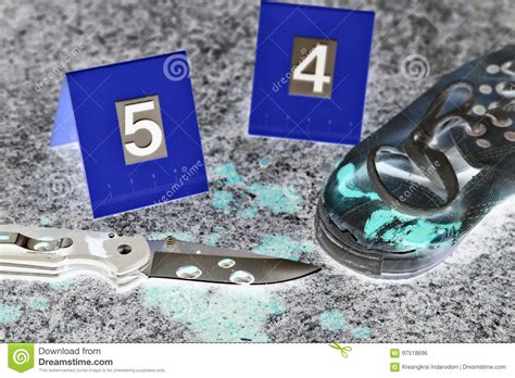 Crime Scene Investigation Bloody Knife And Victim`s Shoes With
