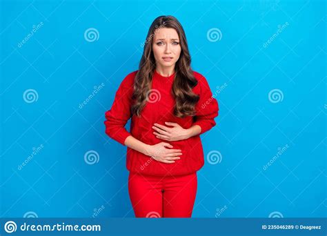 Photo Of Young Girl Unhappy Upset Stomach Ache Infection Unhealthy Sick Isolated Over Blue Color
