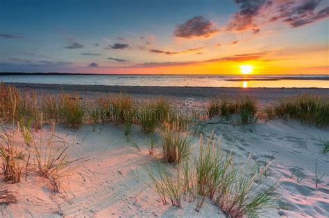 A Beautiful Sunset On The Beach Of The Sobieszewo Island At The Baltic Sea Poland Stock Photo