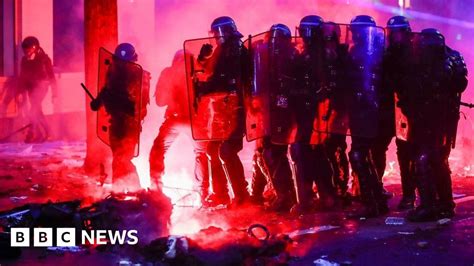 Police Clash With Protesters In Paris Over New Security Law Bbc News