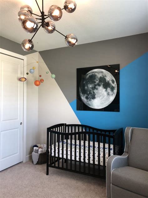 It's crafted with knit embroidery and inspires a galactic adventure on all their outings. Preston's Space Themed Nursery in 2020 | Space themed ...
