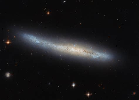 Hubble Sees A Spiral Galaxy Edge On