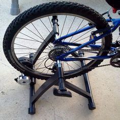 Also, some diy stationary bike stand crafters have added simple modifications that make this project uniquely their own. Natural Wood Indoor Bicycle Stand for Under $15 USD | My ...