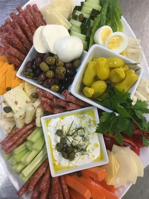 Go heavy on the appetizers when we say it's okay to serve heavy hors d'oeuvres, we really do mean heavy. Antipasto | Wedding food, Food, Appetizers