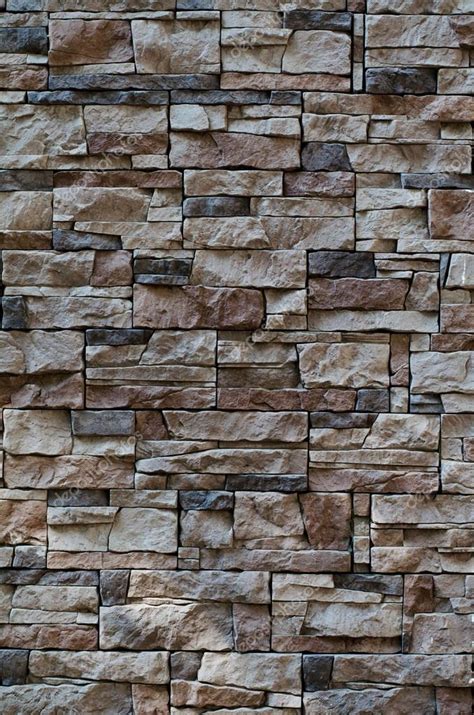 Cladding Texture Of A Stone Wall Background Of Natural Stone Materials