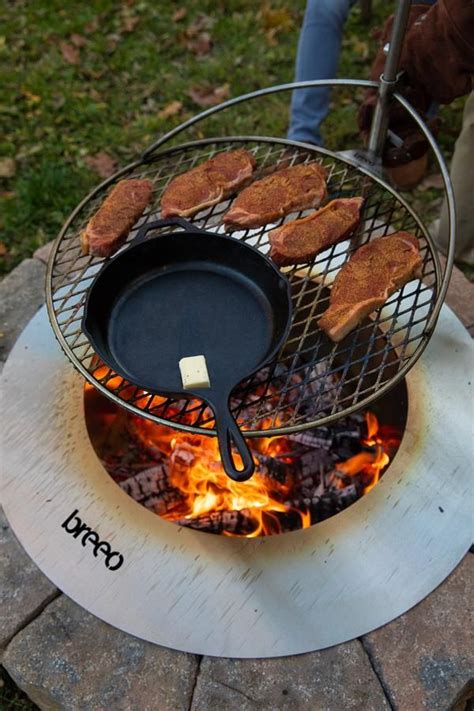 It measures about 16 and a half inches in length and about 19 inches in diameter; Stainless Zentro Grilling Package (Stainless Fire Pit ...