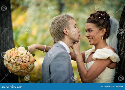 Portrait Of Kissing Newlyweds Stock Photo Image Of Look Beautiful