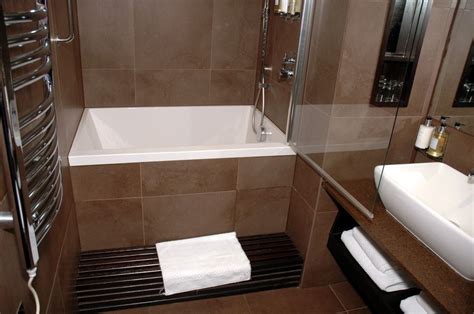 Amazing l shaped kitchen designs with island february 19, 2021. Small Soaking Bathtub / Shower combo Great for small ...