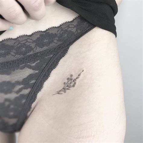 Getting a tattoo on my hip. inner-hip-flower-tattoo | Tiny Tattoo inc