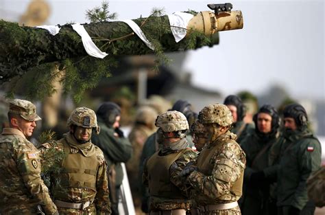 even as trump seeks warmer ties with russia u s deploys troops across eastern europe the