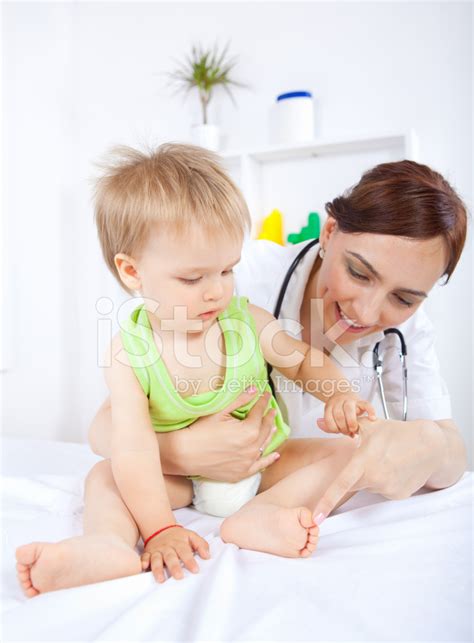 Baby With Pediatrician Stock Photo Royalty Free Freeimages