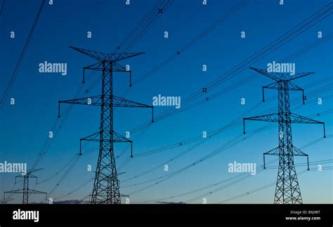 Electrical Transmission Towers Carrying High Voltage Lines Stock Photo