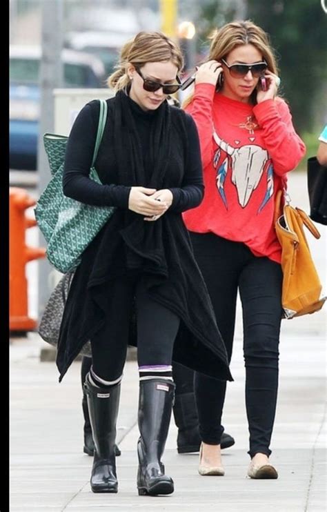 Hilary Duff In Black Leggings Socks And Rubber Wellies Boots