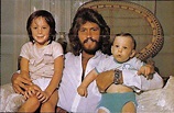 Barry loves his kids....you can see it on his face. | Barry gibb ...