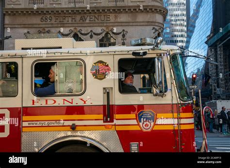 Fdny Fire Engine On The Fifth Avenue At Midtown Manhattan Stock Photo
