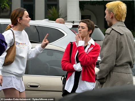 Maisie Williams Puffs On A Cigarette As She Goes Shopping With Friends