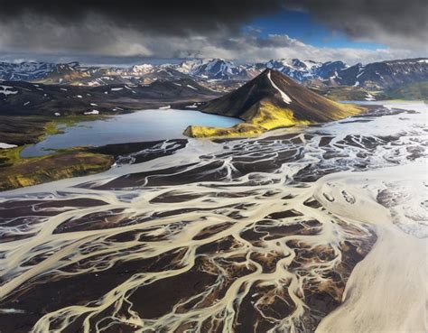 The Intersection Of Crater Lakes And Glaciers In Icelands Majestic