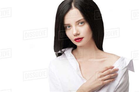 Portrait Of Pensive Woman Looking At Camera Looking At Camera Isolated On White Stock Photo