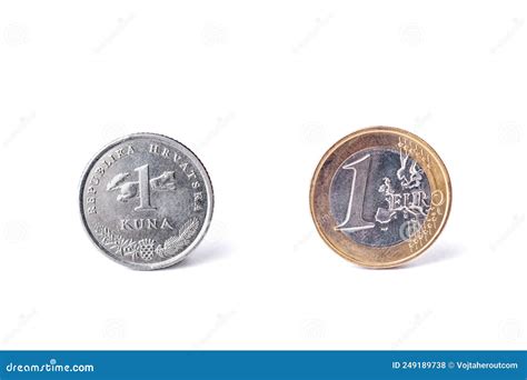 One Croatian Kuna Coin And One Euro Coin Detailed Studio Shot Stock