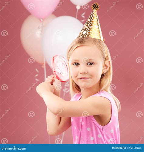 Girl Kid Birthday Party And Balloons In Studio Portrait Lollipop And
