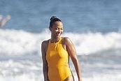 Zoe Saldana Relaxing In Tight Swimsuit On A Beach - PlayCelebs.net