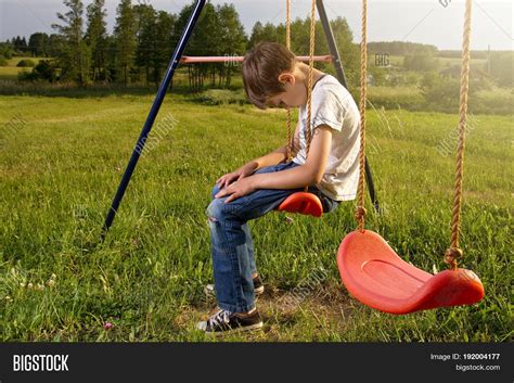 Sad Lonely Boy Sitting Image And Photo Free Trial Bigstock