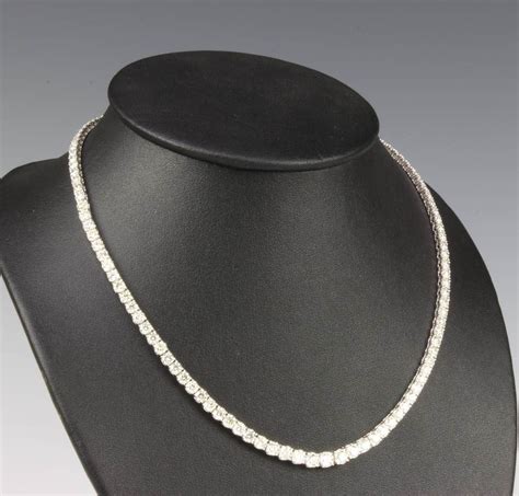 Lot 609 An 18ct White Gold Graduated Diamond Line Necklace 22cts